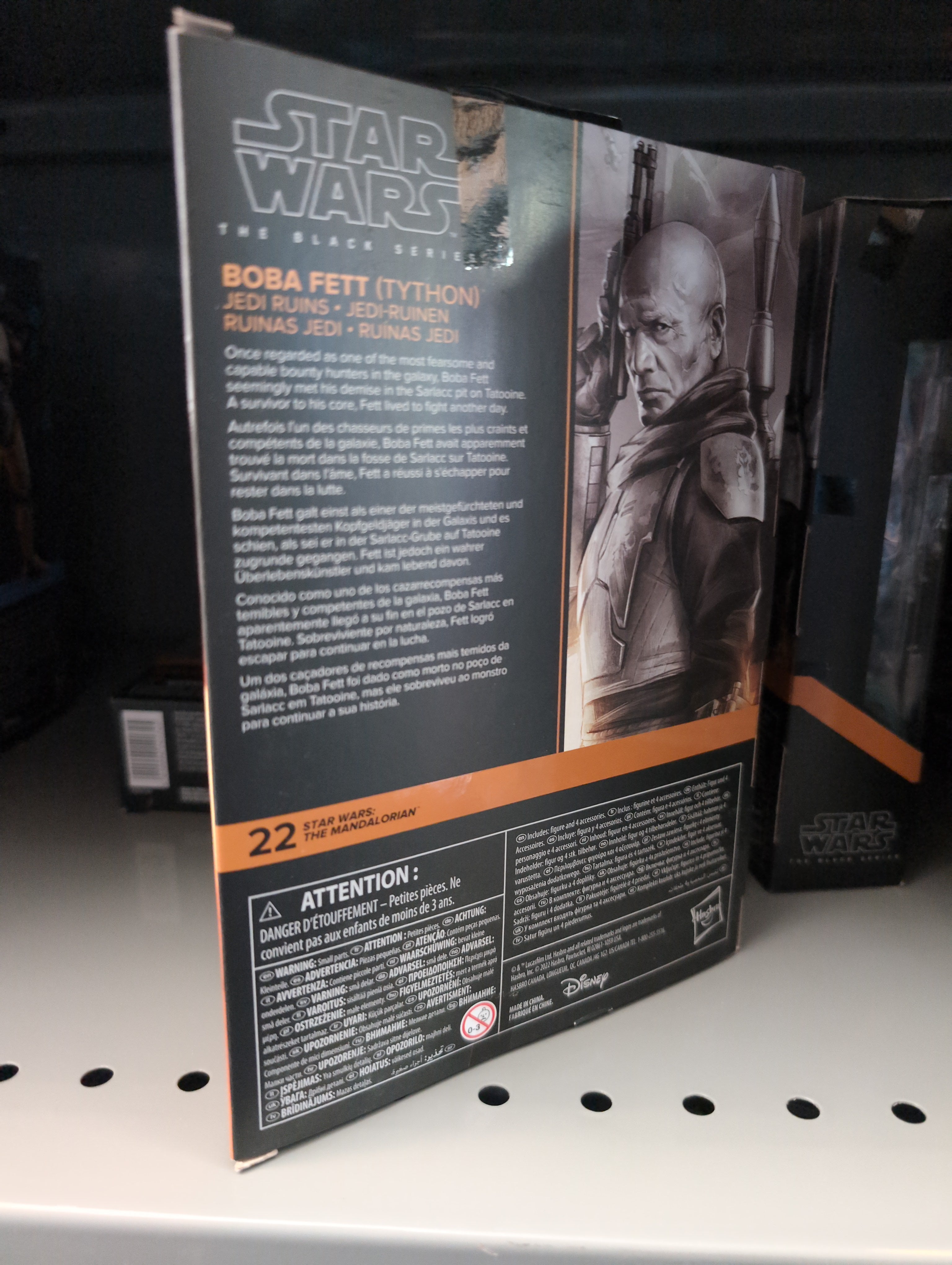 Hasbro Star Wars Black Series Boba Fett Tython-Armor action figure packaging with character bio and artwork on shelf display.