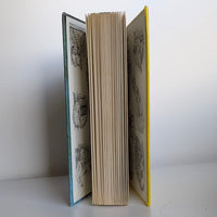 34 The Hidden Window Mystery Nancy Drew Book -1956/1975 (white-endpages) by Grosset & Dunlap, Inc., opened standing upright