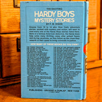 Back cover of vintage Hardy Boys book 25 The Secret Panel published by Grosset & Dunlap New York