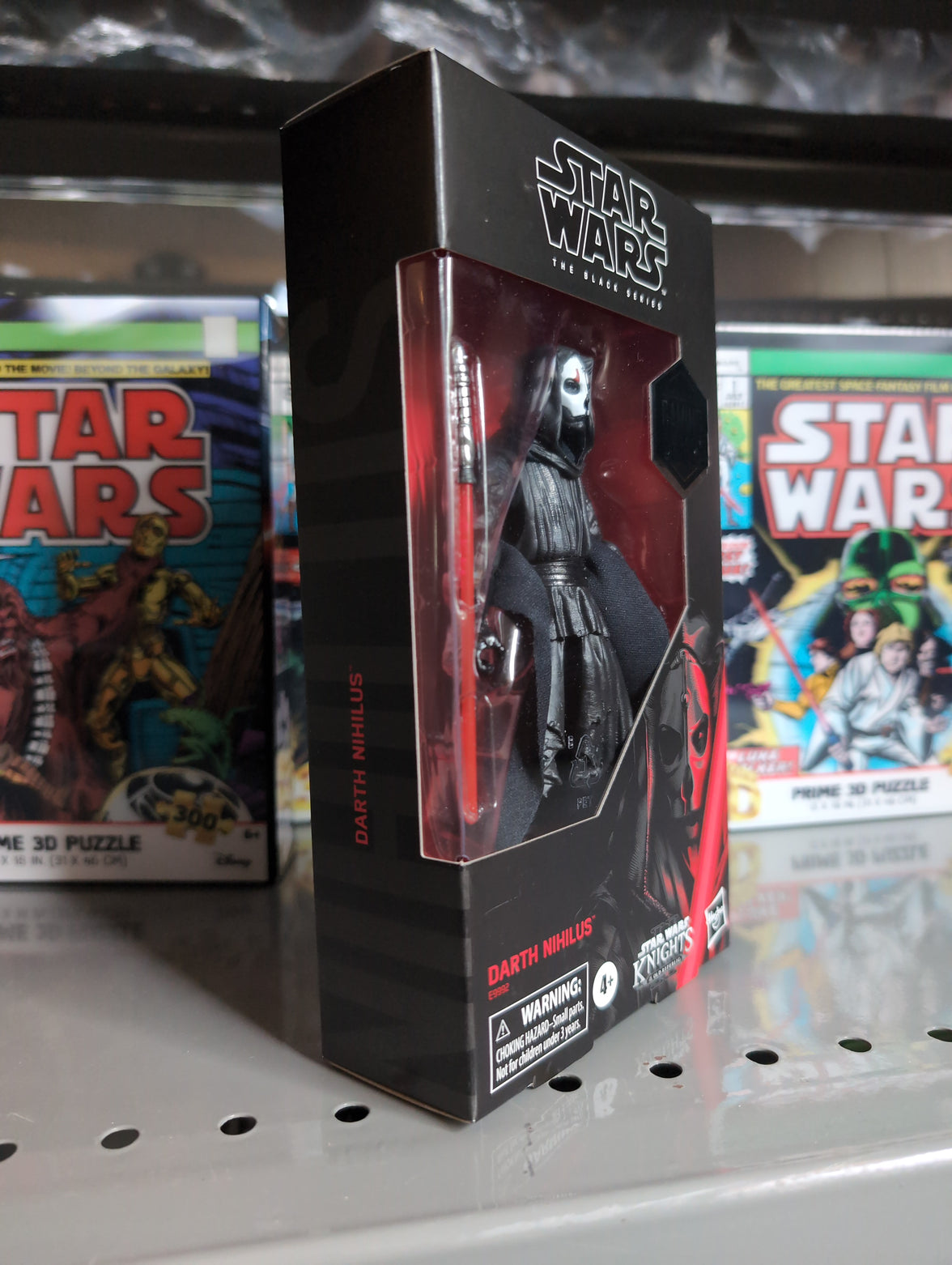 Hasbro Star Wars Black Series Darth Nihilus 6-inch action figure in packaging with iconic mask and robes displayed.