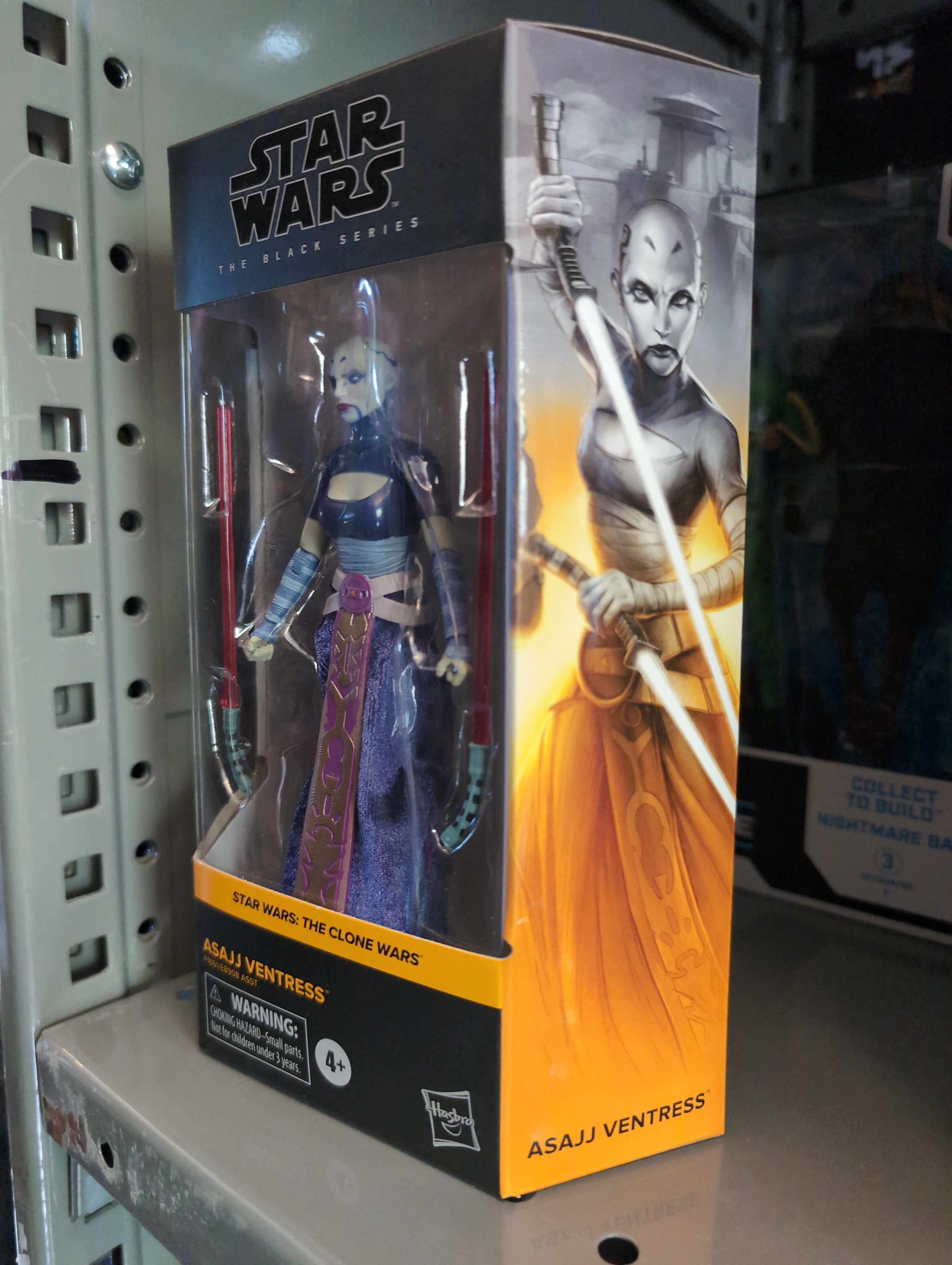 Hasbro Star Wars Black Series Asajj Ventress action figure in packaging with detailed art and dual lightsabers visible