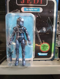 Hasbro Carbonized TIE Fighter Pilot action figure with metallic finish and blaster from Star Wars Black Series packaging