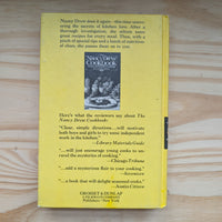 Back cover of 19 The Quest of the Missing Map Nancy Drew Mystery Books 1942/1969 (yn-we) by Grosset & Dunlp, Inc.