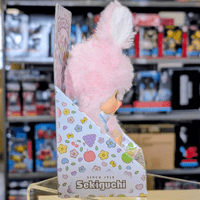 4.75 inch Sekiguchi Monchhichi Chimutan plush doll dressed in pastel pink bunny costume in decorated box